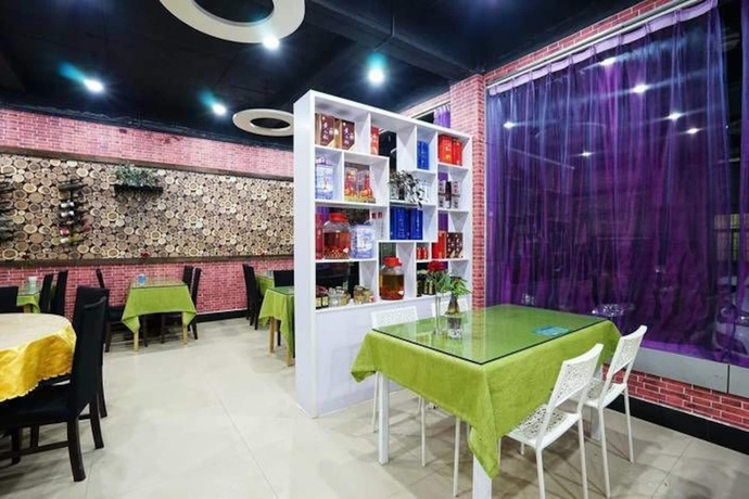 Imagen del bar/restaurante del Hotel Huangshan Best Youth Theme. Foto 3