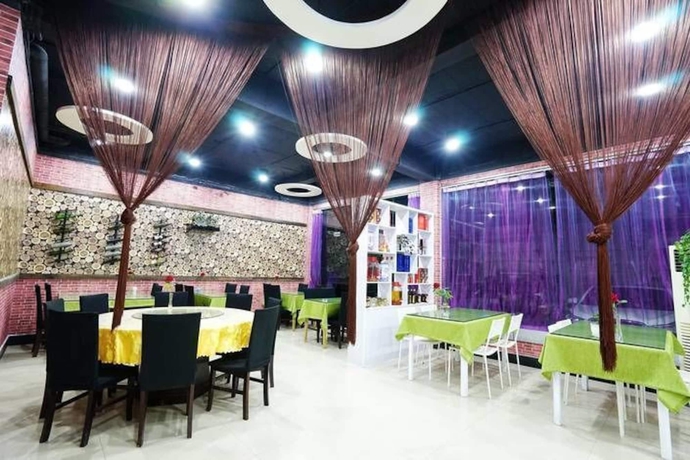 Imagen del bar/restaurante del Hotel Huangshan Best Youth Theme. Foto 4