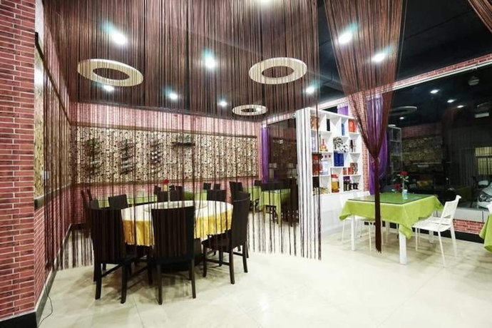 Imagen del bar/restaurante del Hotel Huangshan Best Youth Theme. Foto 5