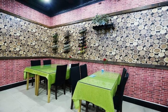 Imagen del bar/restaurante del Hotel Huangshan Best Youth Theme. Foto 6