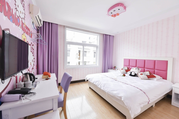 Imagen de la habitación del Hotel Huangshan Best Youth Theme. Foto 8