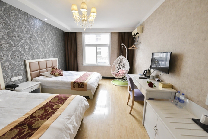 Imagen de la habitación del Hotel Huangshan Best Youth Theme. Foto 9