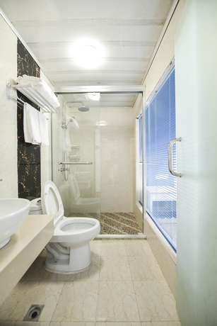 Imagen de la habitación del Hotel Huangshan Best Youth Theme. Foto 12