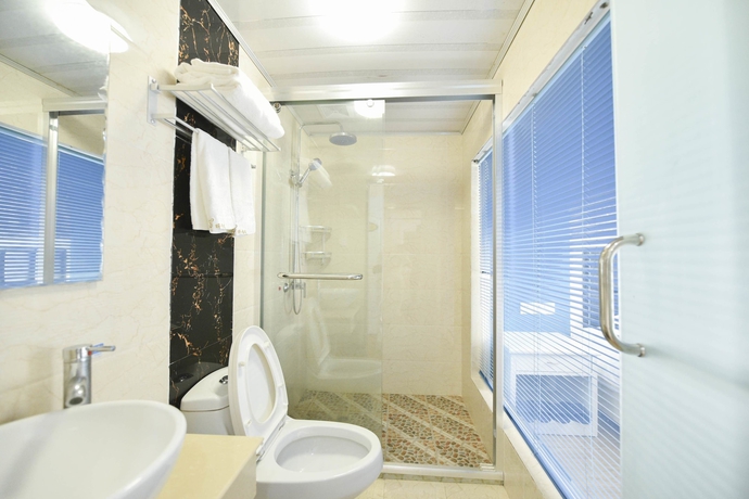 Imagen de la habitación del Hotel Huangshan Best Youth Theme. Foto 13