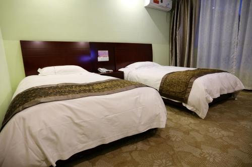 Imagen de la habitación del Hotel Huangshan Four Season Yihe. Foto 9