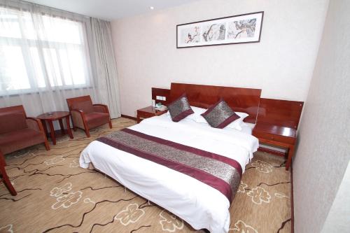 Imagen de la habitación del Hotel Huangshan Huanqiu. Foto 5