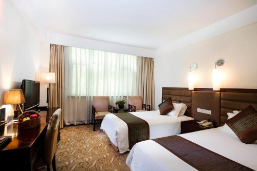 Imagen de la habitación del Hotel Huangshan Jinpu Dongyi. Foto 6