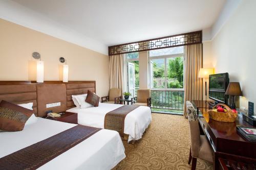Imagen de la habitación del Hotel Huangshan Jinpu Dongyi. Foto 8