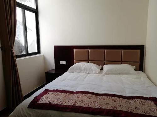 Imagen de la habitación del Hotel Huangshan Xingzhe Inn. Foto 6