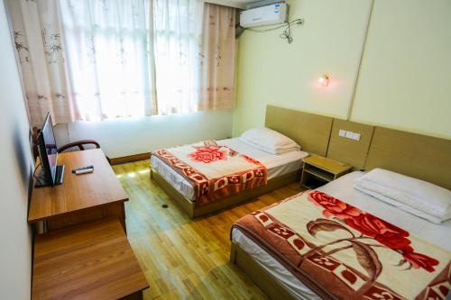 Imagen de la habitación del Hotel Huangshan Xingzhe Inn. Foto 7