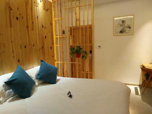 Imagen de la habitación del Hotel Huangshan Yujian Weichi Homestay. Foto 8