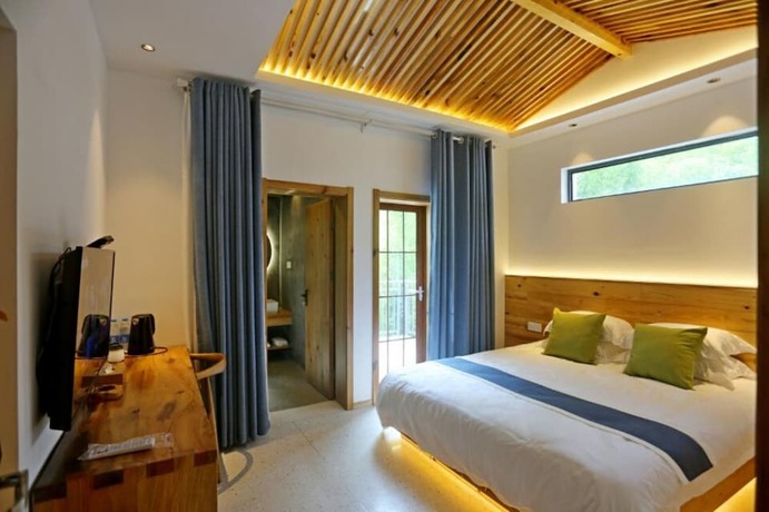 Imagen de la habitación del Hotel Huangshan Yujian Weichi Homestay. Foto 11