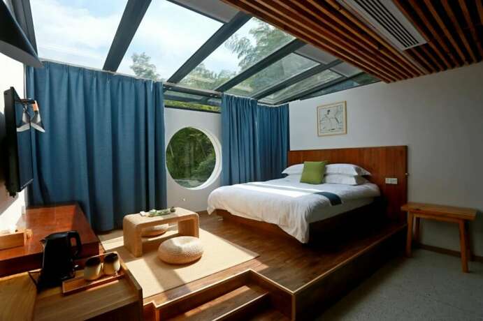 Imagen de la habitación del Hotel Huangshan Yujian Weichi Homestay. Foto 13