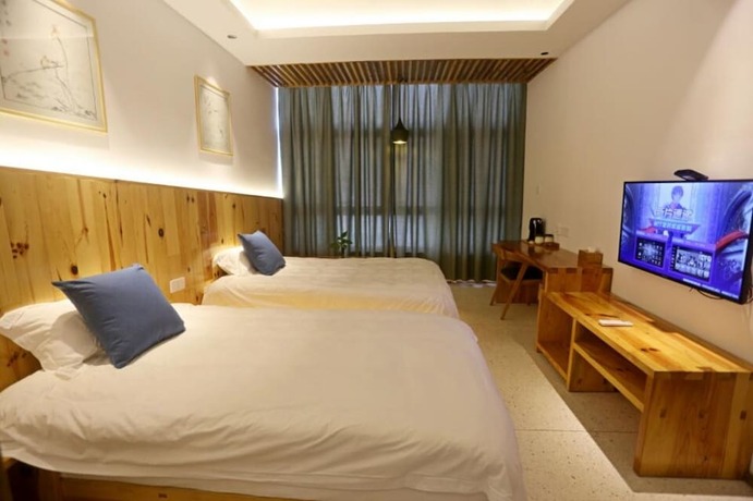 Imagen de la habitación del Hotel Huangshan Yujian Weichi Homestay. Foto 14