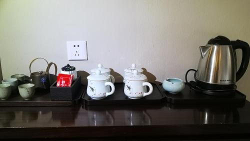 Imagen de la habitación del Hotel Huangshan Yupinglou. Foto 8