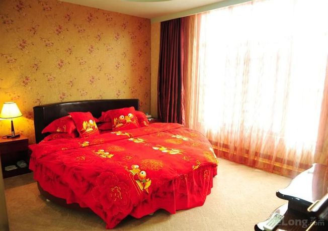 Imagen de la habitación del Hotel Huangshan Zhongshan International. Foto 8