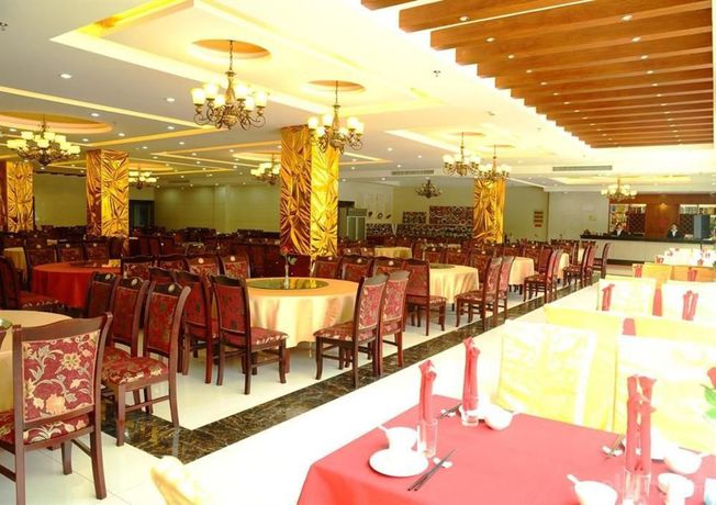 Imagen del bar/restaurante del Hotel Huangshan Zhongshan International. Foto 7