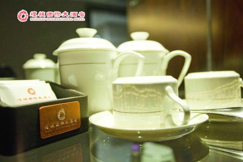 Imagen general del Hotel Huangzu International. Foto 7