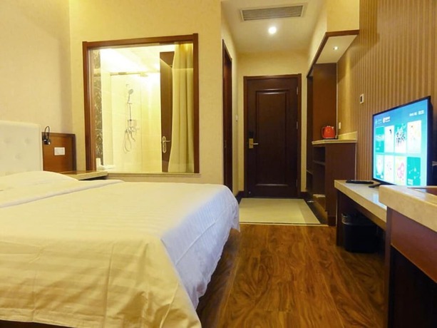 Imagen de la habitación del Hotel Huaqi Kaiserdom. Foto 9