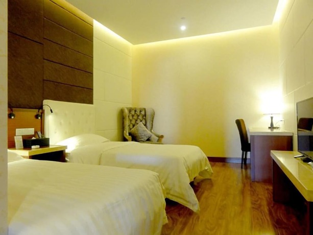 Imagen de la habitación del Hotel Huaqi Kaiserdom. Foto 11
