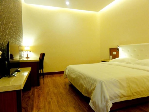 Imagen de la habitación del Hotel Huaqi Kaiserdom. Foto 12
