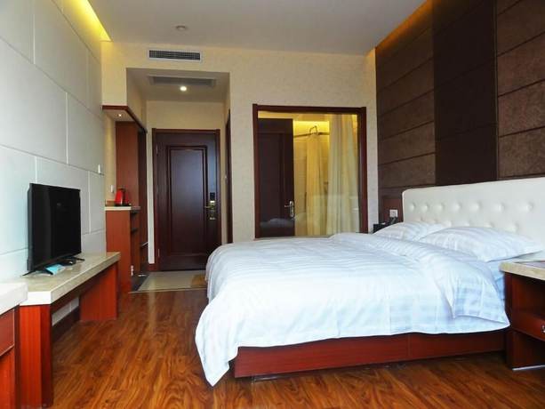 Imagen de la habitación del Hotel Huaqi Kaiserdom. Foto 14