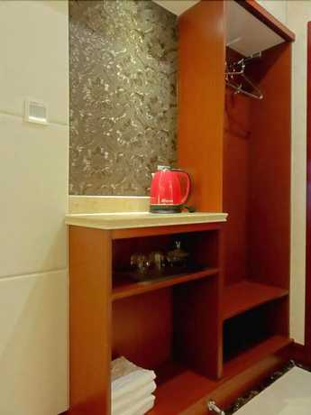 Imagen de la habitación del Hotel Huaqi Kaiserdom. Foto 16