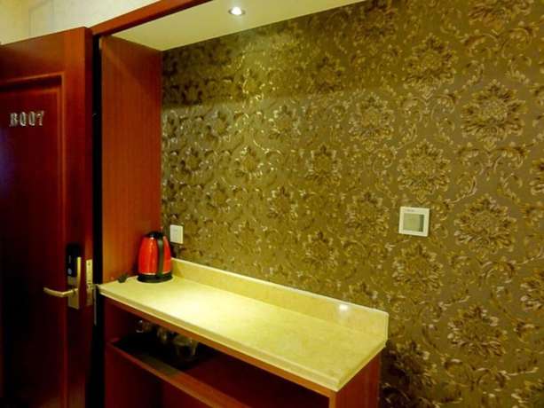 Imagen de la habitación del Hotel Huaqi Kaiserdom. Foto 19