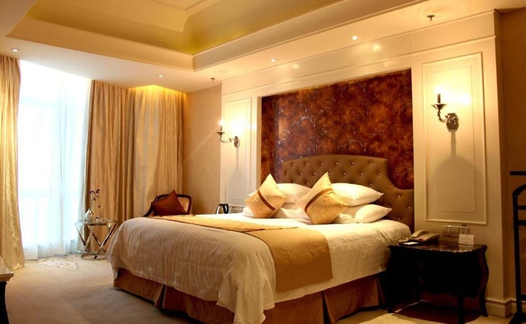 Imagen de la habitación del Hotel Huaqiao New Century Grand. Foto 9