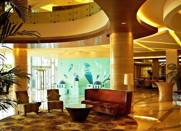 Imagen de los interiores del Hotel Huaqiao New Century Grand. Foto 16