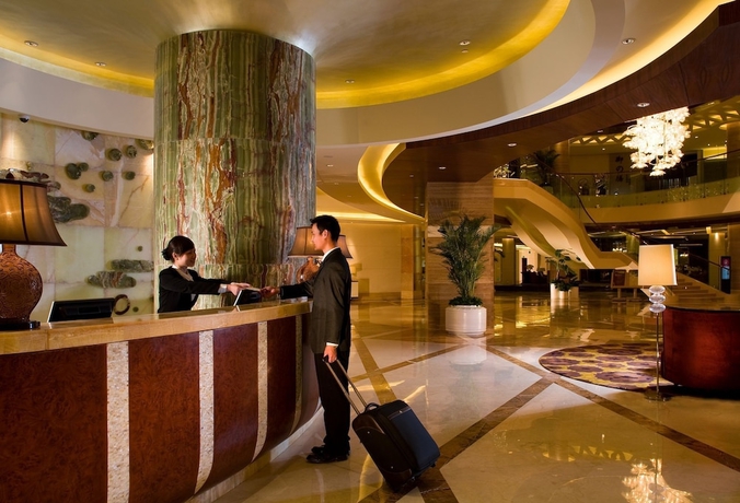 Imagen de los interiores del Hotel Huaqiao New Century Grand. Foto 17