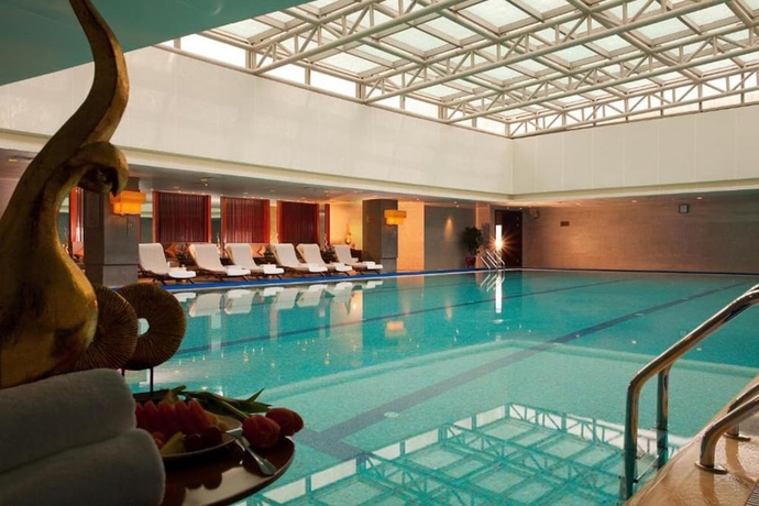 Imagen de la piscina del Hotel Huaqiao New Century Grand. Foto 19