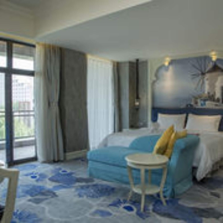 Imagen de la habitación del Hotel Huaqing Aegean Inter Hot Spring Resort. Foto 4
