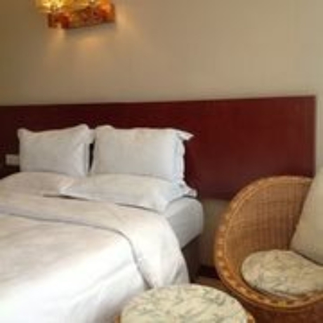 Imagen de la habitación del Hotel Huaqing Aegean Inter Hot Spring Resort. Foto 5