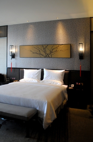 Imagen de la habitación del Hotel Huaqing Aegean Inter Hot Spring Resort. Foto 11