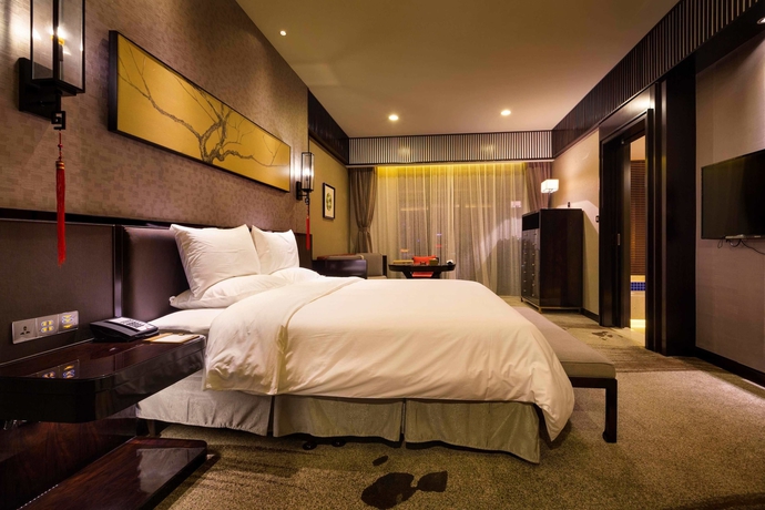 Imagen de la habitación del Hotel Huaqing Aegean Inter Hot Spring Resort. Foto 12