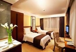 Imagen de la habitación del Hotel Huaren International Hotel. Foto 3