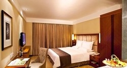 Imagen de la habitación del Hotel Huaren International Hotel. Foto 5
