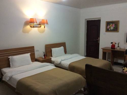 Imagen de la habitación del Hotel Huashan Gehui. Foto 4