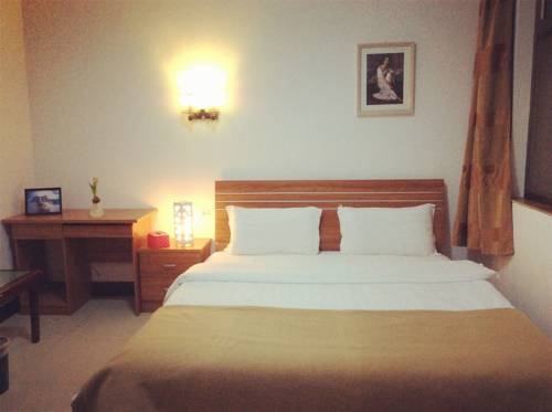 Imagen de la habitación del Hotel Huashan Gehui. Foto 5