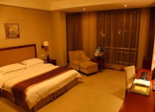 Imagen de la habitación del Hotel Huashan Mountain International. Foto 16