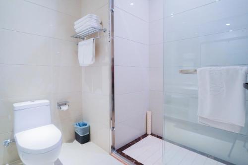 Imagen de la habitación del Hotel Huashan Xinyuan International. Foto 18