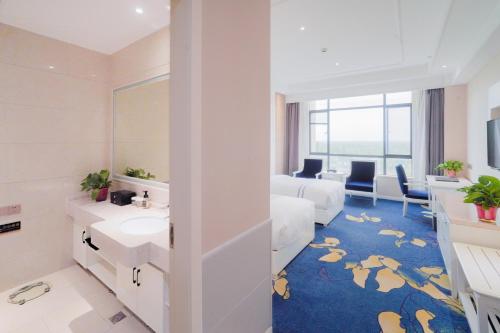 Imagen general del Hotel Huashan Xinyuan International. Foto 13