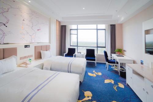 Imagen general del Hotel Huashan Xinyuan International. Foto 17