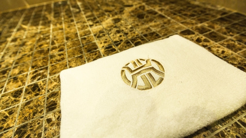 Imagen de la habitación del Hotel Huatian Chinagora. Foto 6