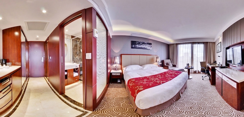 Imagen de la habitación del Hotel Huatian Chinagora. Foto 7