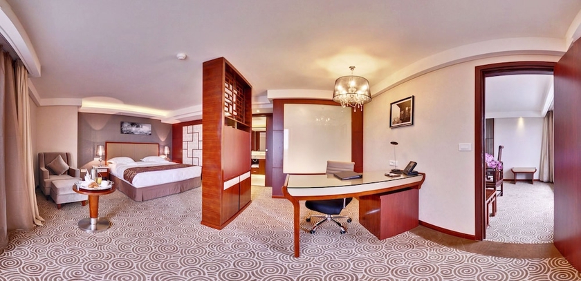 Imagen de la habitación del Hotel Huatian Chinagora. Foto 11