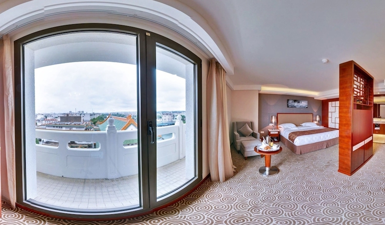 Imagen de la habitación del Hotel Huatian Chinagora. Foto 16