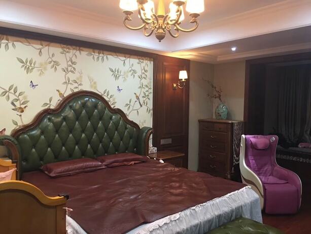 Imagen de la habitación del Hotel Huating Villa. Foto 11