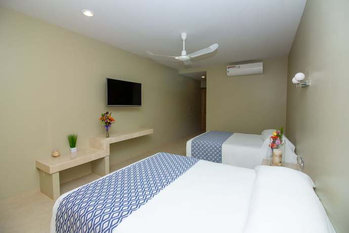Imagen de la habitación del Hotel Huatulco Maxico. Foto 9